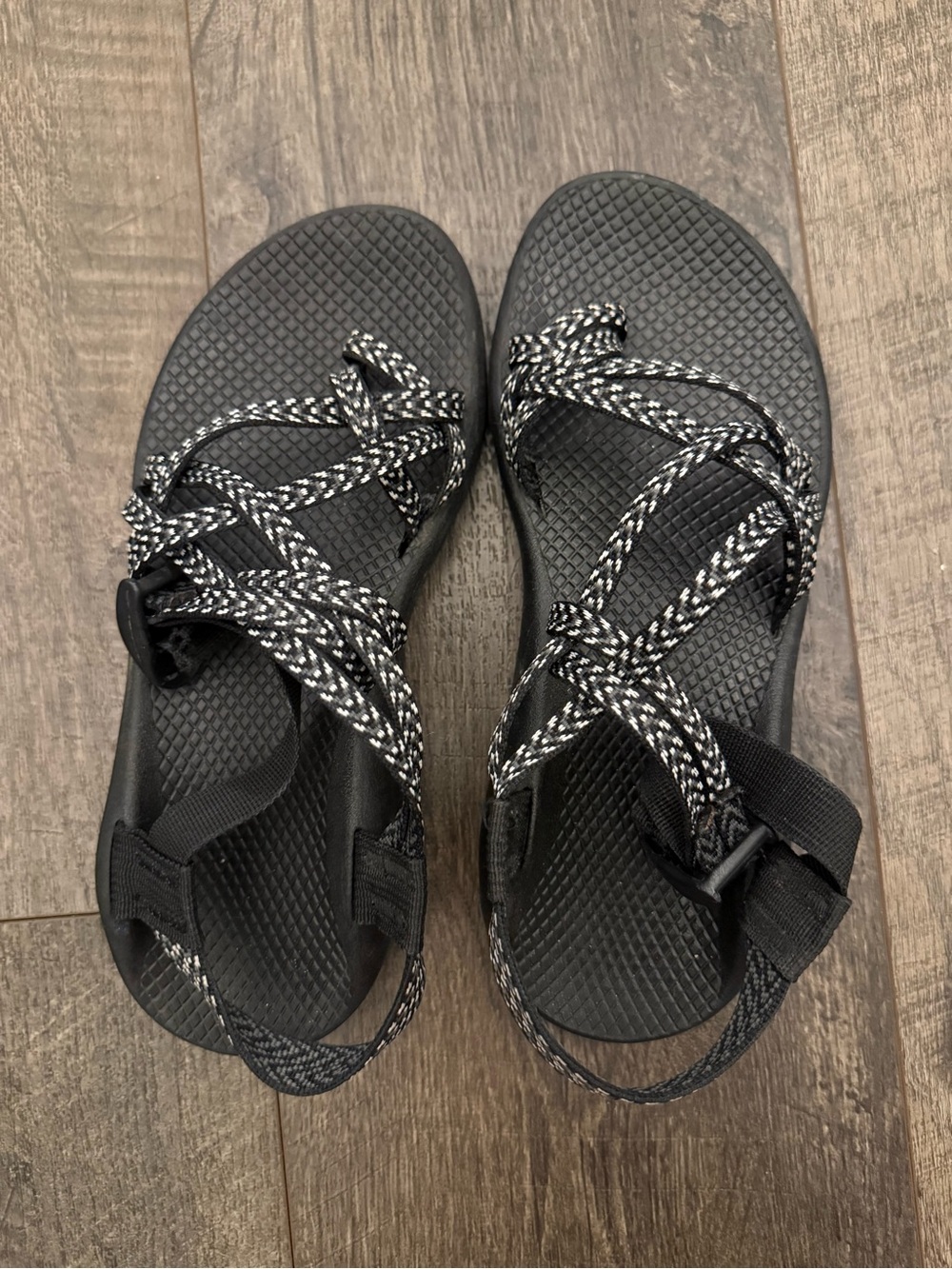 Chaco women’s Black Sandals with Black-and-White Straps